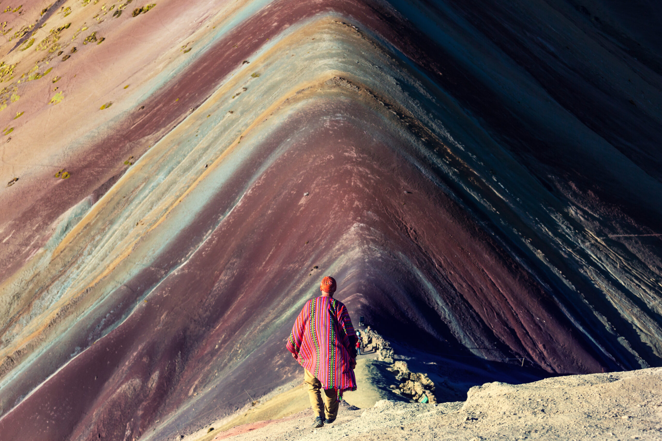 Hiking scene in Vinicunca, Cusco Region, Peru. Montana de Siete Colores, Rainbow Mountain.
